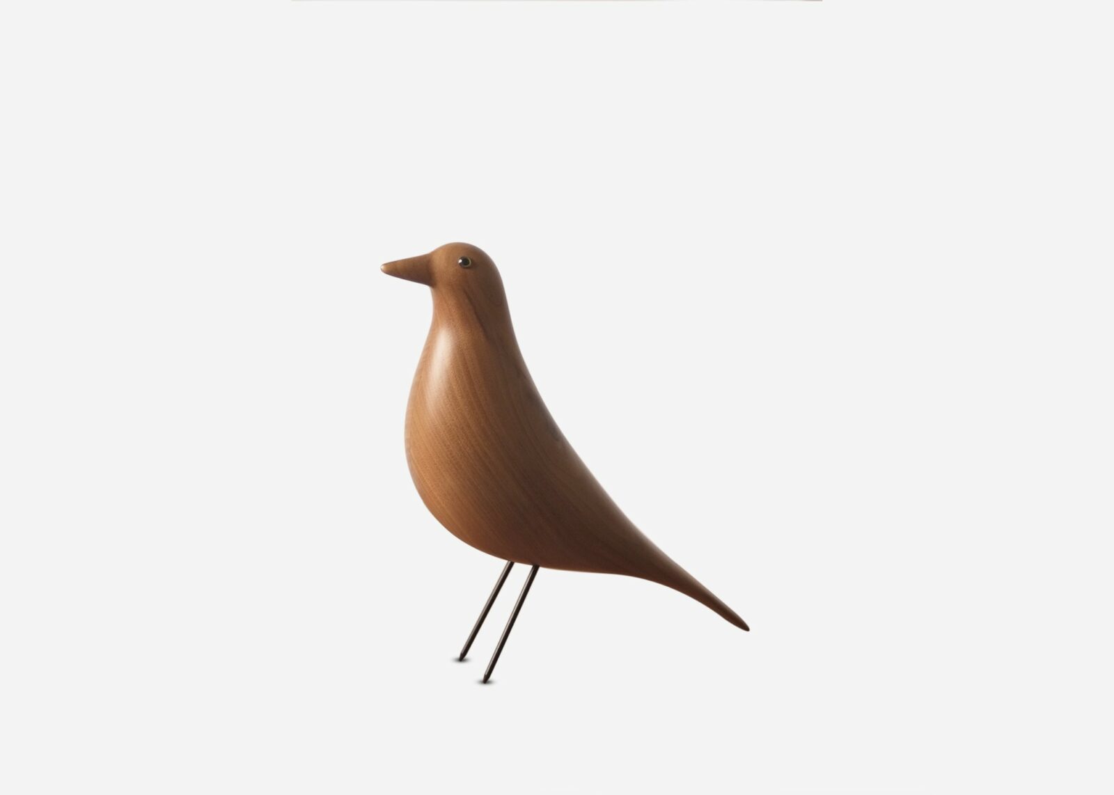 dimensiones en cm y pulgadas del Eames house bird. Pájaro
